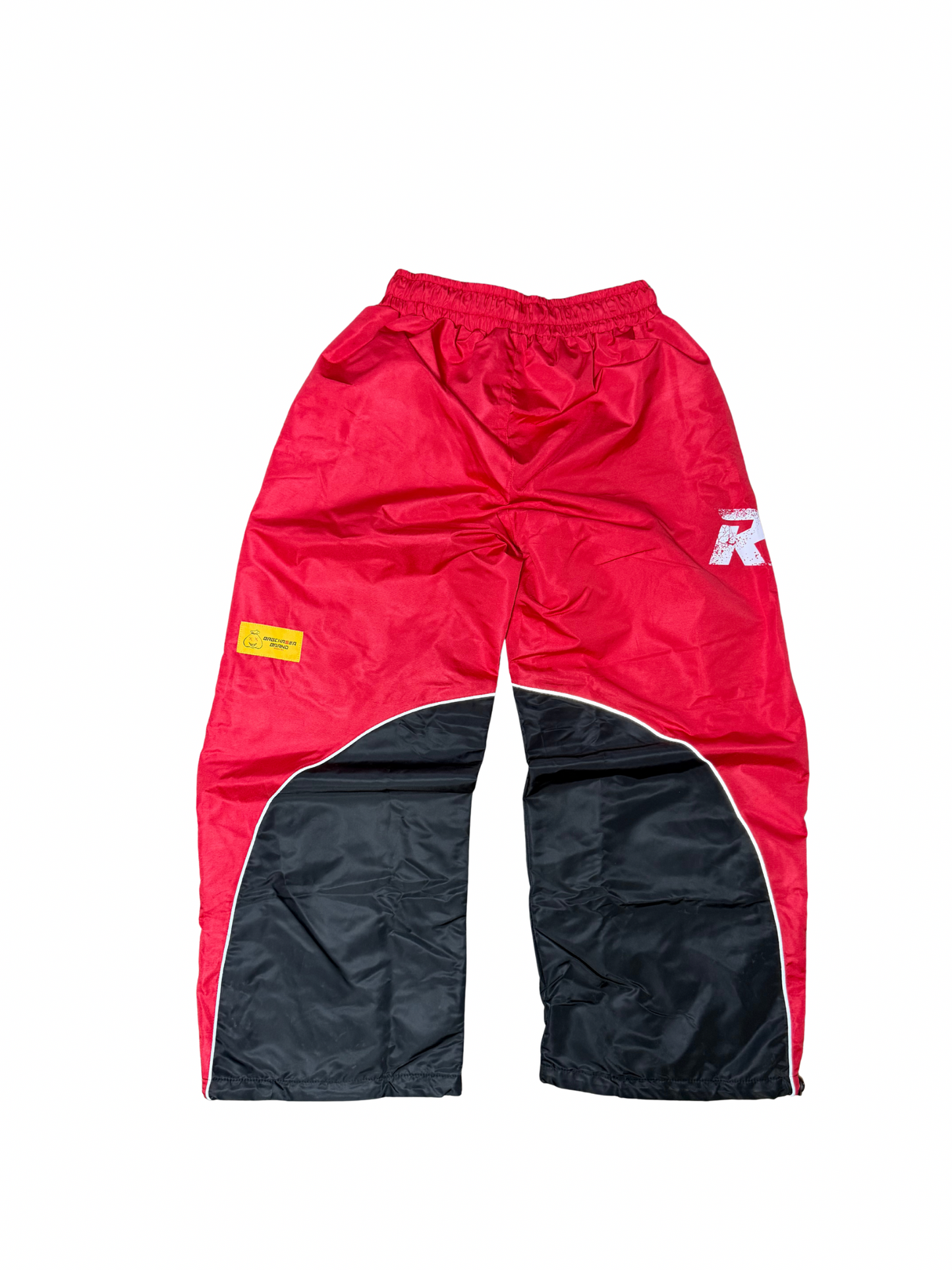 RED WINDBREAKER PANTS
